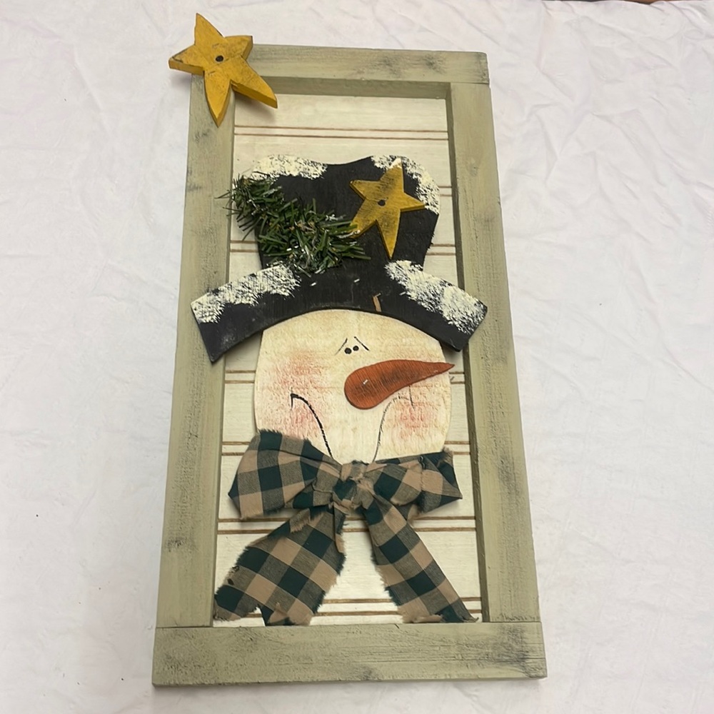Framed snowman art work